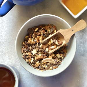 Loose tea with wooden scoop