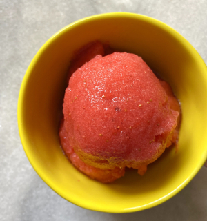 Strawberry sorbet in yellow bowl