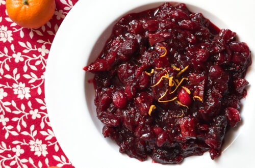 Brandied cranberry sauce on a festive red tablecloth